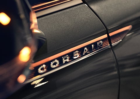 The stylish chrome badge reading “CORSAIR” is shown on the exterior of the vehicle. | Purchase Lincoln in Mayfield KY