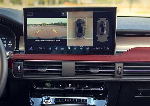 The driver of a 2024 Lincoln Corsair® SUV is shown selecting the drive mode. | Purchase Lincoln in Mayfield KY