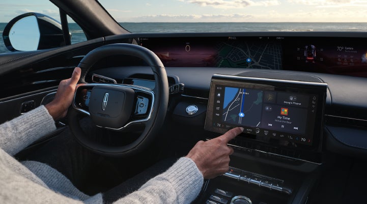 The driver of a 2024 Lincoln Nautilus® SUV interacts with the new Lincoln Digital Experience. | Purchase Lincoln in Mayfield KY