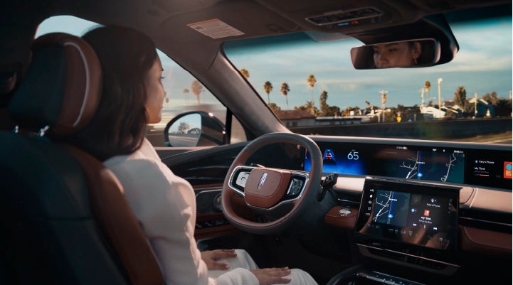 A person is shown driving hands-free on the highway with available Lincoln BlueCruise technology. | Purchase Lincoln in Mayfield KY